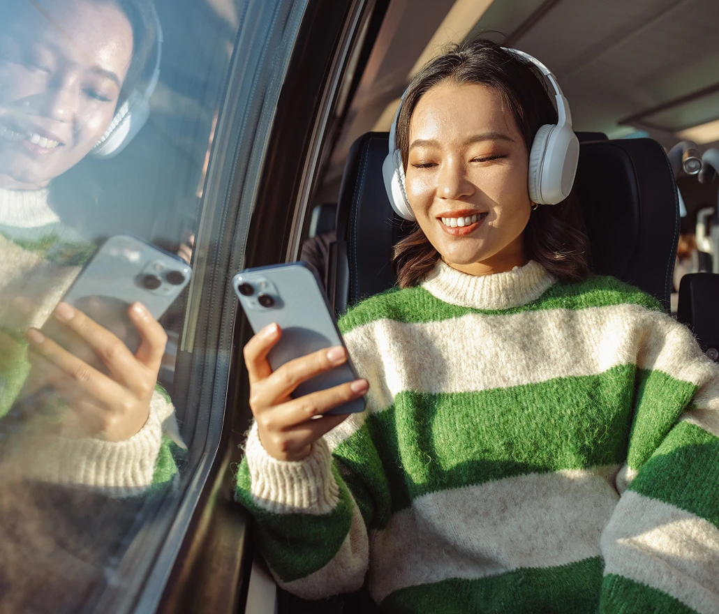 Girl on phone in train